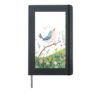 Cheerful Bird on Branch Surrounded by Colorful Spring Flower Hardcover Journal, Black