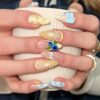 CUZIAM Baby Blue Butter Yellow Press on Nails Medium Almond Summer Fake Nails with 3D Lemon Blueberry Designs Cute Bow Stick on Nails, 30PCS Salon Quality Fruit Nail Press ons for Women Girl Manicure