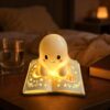 HAOPAIXW Ghost Bookshelf Lantern, Spooky Cute Ghost Reading Book Lamp with Flameless LED Tea Light, Cozy Halloween Night Light Desk Decor for Bedroom and Book Lover Gifts (5.1")