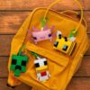 Paladone Minecraft Felt Bag Charm Deluxe Kit – Craft Kit with Creeper, Bee, Chicken & Axolotl Charms – Includes Felt Pieces, Thread & Clasps
