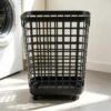 2.6 Bushel Rolling Laundry Hamper in Black Plastic