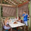 Coolaroo Outdoor Roller Shade with Wand - 95% UV Block Breathable Light Filtering Shade for Patio or Porch, Fade-Resistant, Easy-Clean Fabric, 10ft x 8ft, Walnut