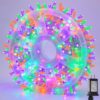 Janshine 1000 LED String Lights Clear Wire Purple and Green