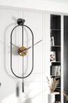 SODEF Serenity Black Gold Modern Metal Wall Clock 11.8 x 31.5 in, Decorative Asymmetrical Design with Silent Quartz Movement and Secure Hanging System - Black Gold