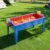 Constructive Playthings Indoor/Outdoor Sand and Water Activity Table for Kids Ages 1-3, Portable Classroom Play Table with Dry-Erase Top and 2 Side Trays, Blue/Red