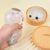 Squishy Dumpling Fidget Sensory Toy with Mini Steamer, Glitter Steamed Bun Stress Comfort Gift, Soft TPR Squeeze Toy with Cute Smiling Face for Adults, Home Office Desk Decor