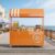 WENQIDAFA Vending Iron Cart with Striped Canopy, Mobile Food Display Stand with Lockable Wheels, Creative Iron Market Stall with Sunshade Canopy and Storage Box for Market Orange55.1 L x 74.8″ H